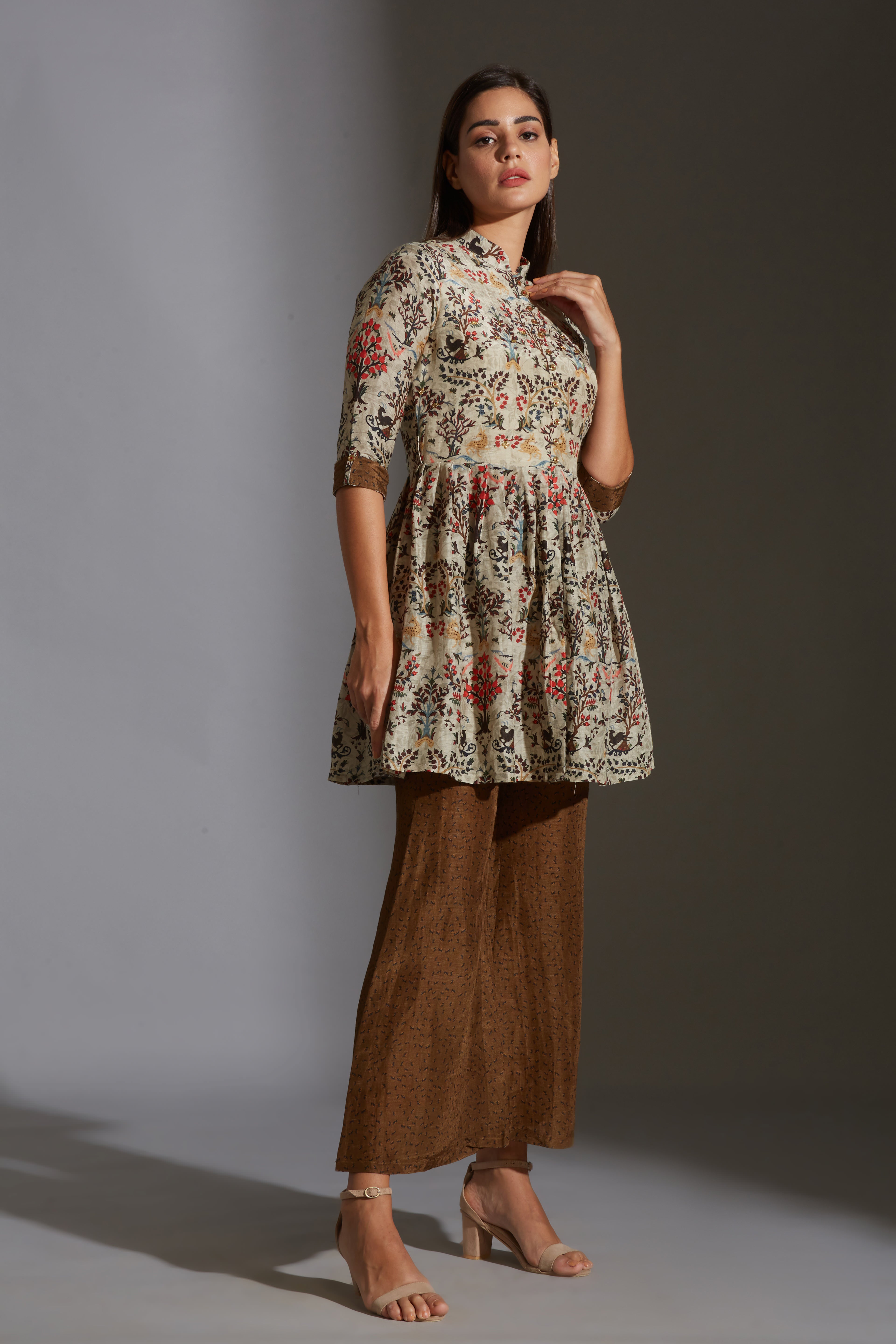 Qaleen Printed Peplum Top And Pinted Pants